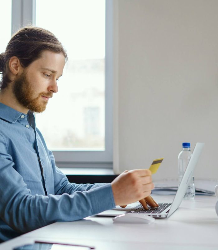 employee-data-privacy-at-work-booking-and-purchasing-with-credit-card-online-at-workspace.jpg